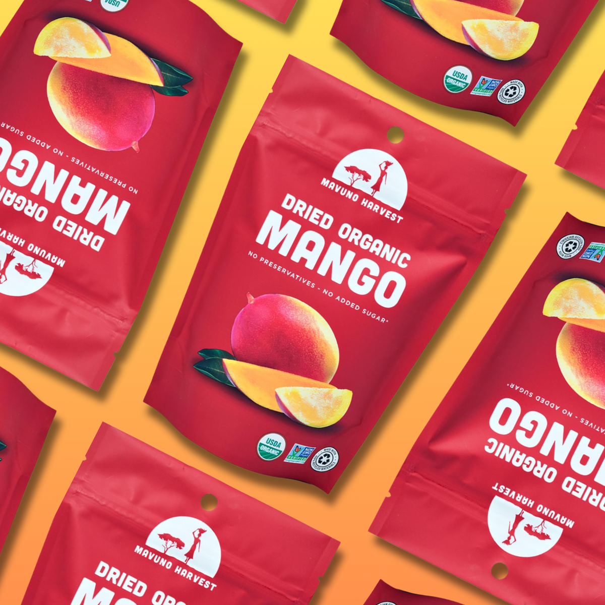 Mavuno organic dried mango packages against a vibrant fruit-colored backdrop