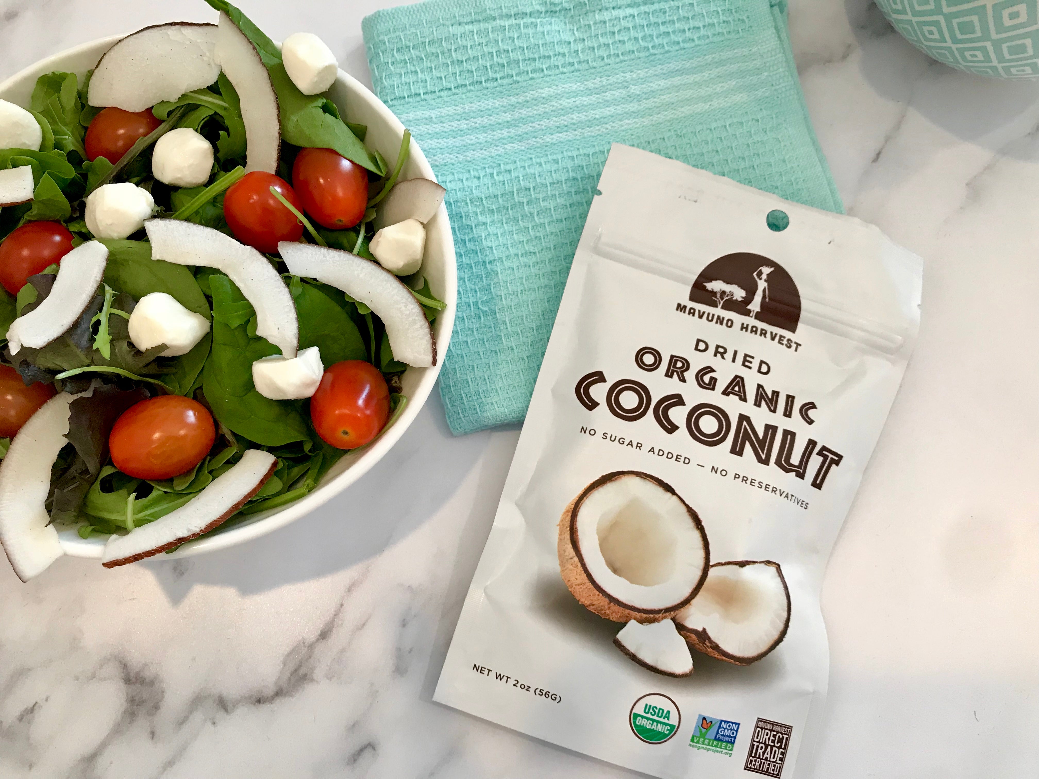 Mavuno dried coconut strips served with a fresh salad