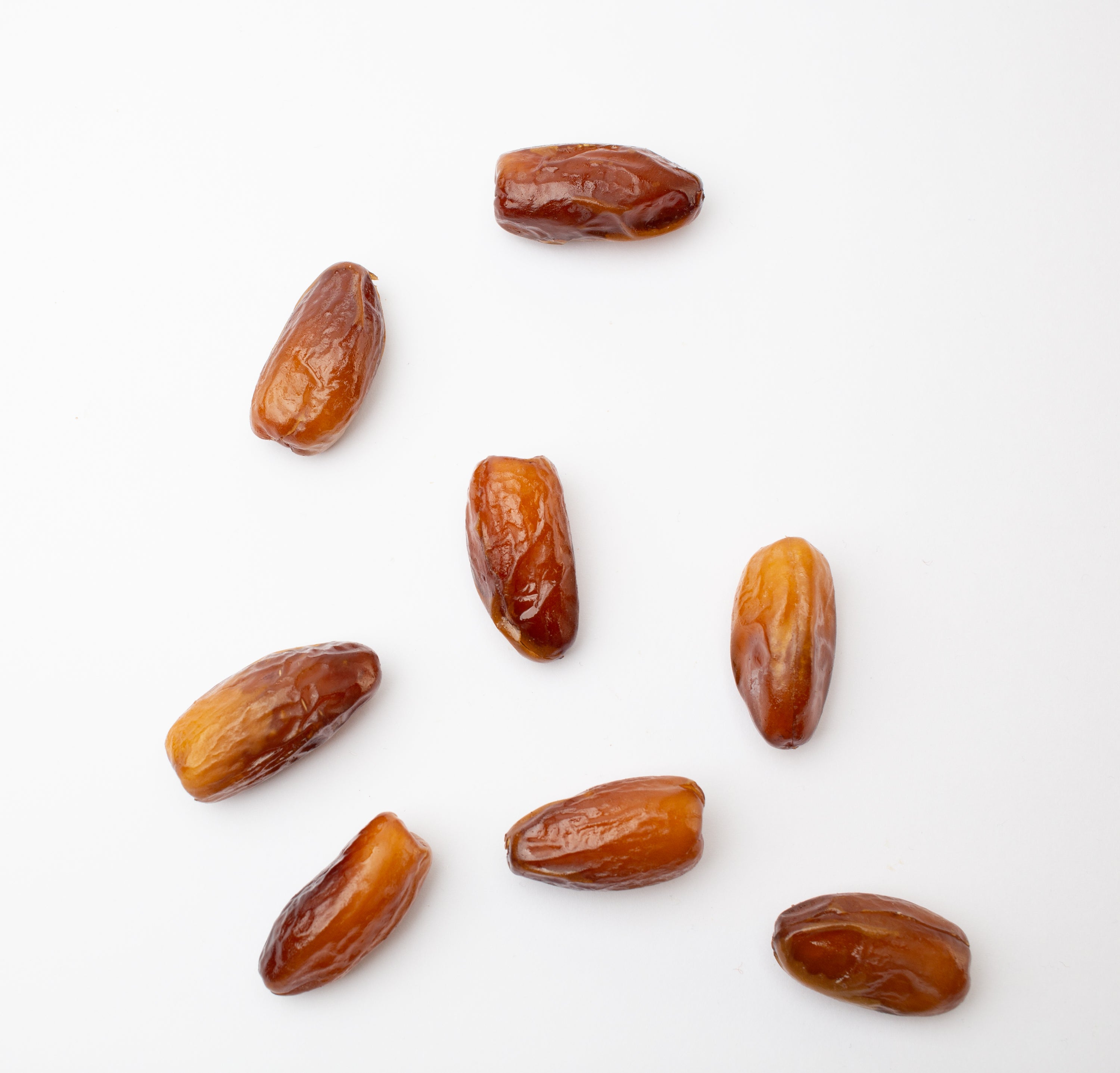 Organic dates arranged on a light surface